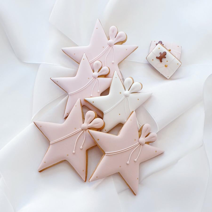 Ausstechform Stern mit Schleife