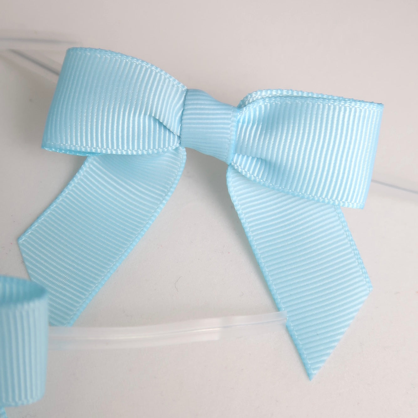 Verschluss mit Schleife - hellblau - 50 Stk