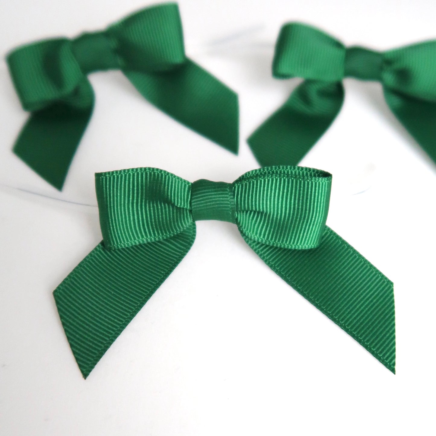 Verschluss mit Schleife - grün - 50 Stk