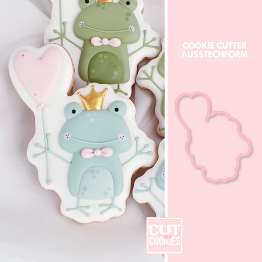 Cookie cutter frog with heart balloon